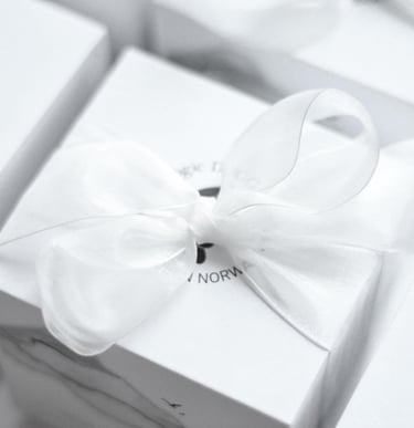 a white box with a bow tie on it
