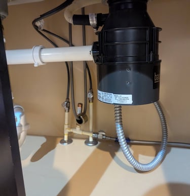 Garbage disposal installation under kitchen sink Dayton OH