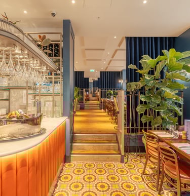 a restaurant with a bar and table