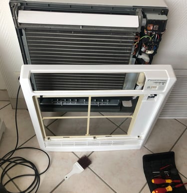 Démontage d'une climatisation console pour l'entretien