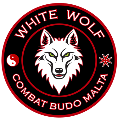 White Wolf Combat Budo Malta martial arts logo with a white wolf head, yin yang symbol, and red circular border.