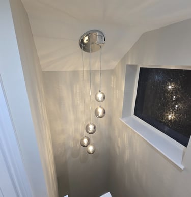 Hanging light in the stair well installed by Easy Spark Ltd in Bromley Kent