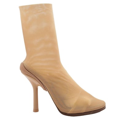 a woman's burberry shoe with a high heel and a high heel