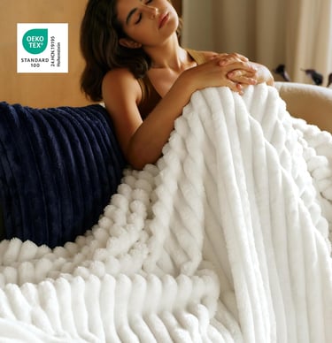 Soft off white fleece throw blanket for cozy living room, bedroom, sofa decor and year-round comfort in modern homes