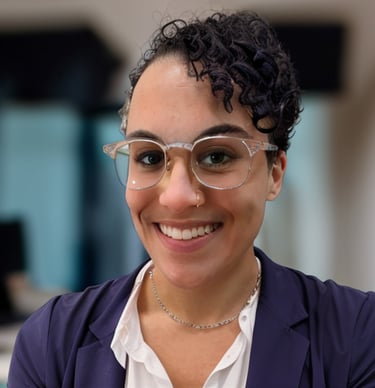 a woman in glasses and a white shirt