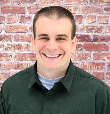 a man in a green shirt and a white shirt