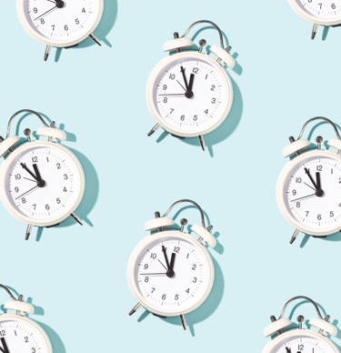 a bunch of clocks on a blue background