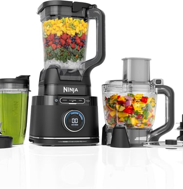 Ninja Foodi Power Blender and Food Processor System with smoothie cup and fruit ingredients.