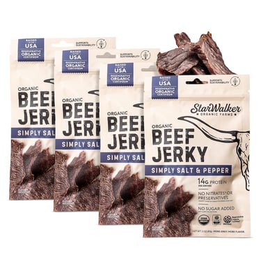 Four bags of StarWalker Organic Beef Jerky in Simply Salt and Pepper flavor with loose dried meat pieces.