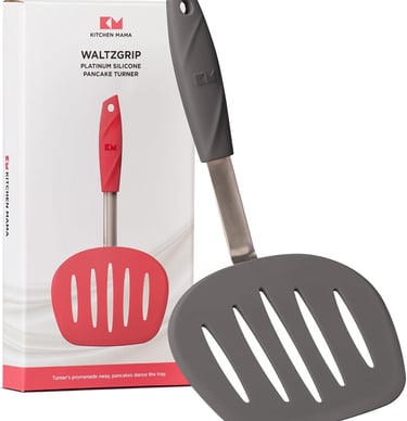 Kitchen Mama WaltzGrip grey platinum silicone slotted pancake turner spatula with its product packaging.