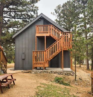 Finished garage build by Elk Valley Contractors featuring a modern exterior.
