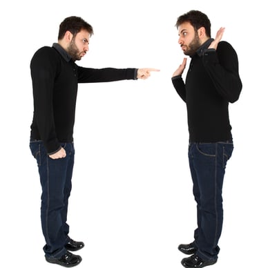 a man with a beard and a beard, pointing at each other