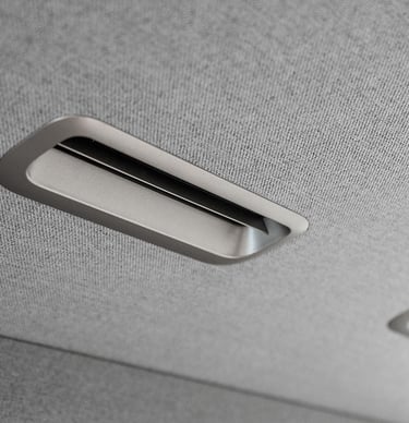 Airflow duct with edge trim inside upper panel