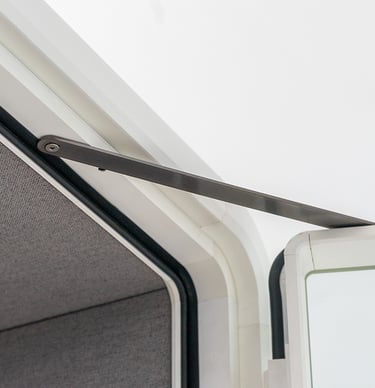 Concealed door closer inside upper door frame