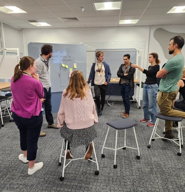 Workshop with participants brainstorming using sticky notes