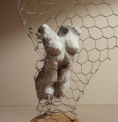 A clickable link leading to a page with further information about the sculpture 'Ensconced'