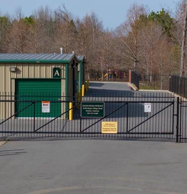 Entrance to Alcoa Road Storage Too at corner of Alcoa Road and Sleepy Village Road