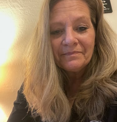 Wendy Stanfill CEO a woman with blonde hair and a black shirt