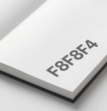 Close-up of a high-quality brand book showing meticulous attention to typography and margin layout. Minimalist and professional style using #F8F8F4.