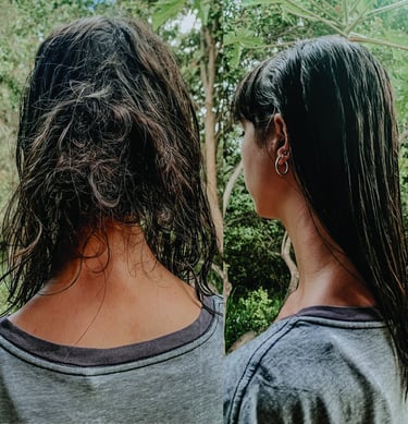 two women who are standing in front of a tree with bad hair knots and with her knots removed