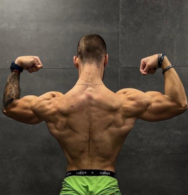 a man in a green underwearsuit with a muscular body