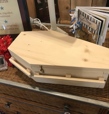 Furniture mixed with Coffins yes that's Old West Coffins