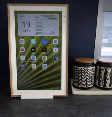 Digital Calendar showing home dashboard apps on a kitchen counter