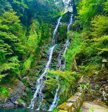 Taki no Kannon statue beside a small waterfall in Nagasaki