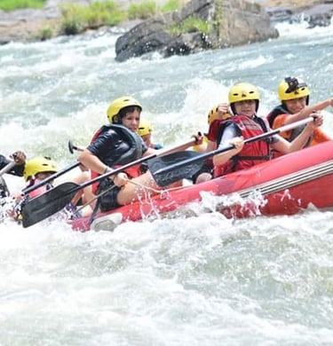 White water rafting is so enjoyable as you are in a team. Don't forget your PPE.