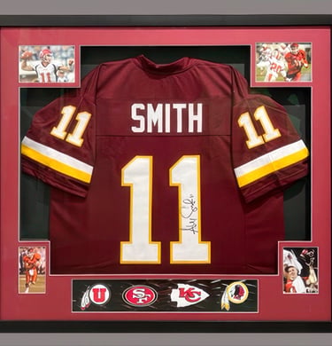 Alex Smith autographed framed football jersey with career highlights and team logos.