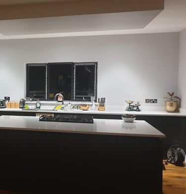 modern kitchen with central island built by b and s construction