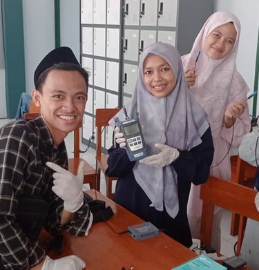 a group of people standing around a table
