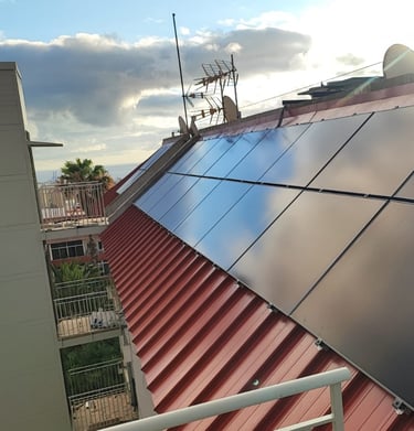 a solar paneled roof with solar panels on a red roof