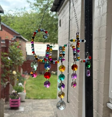 A Random Rainbow Cunt catcher in its new home with a fellow sweary business, Swears of Joy