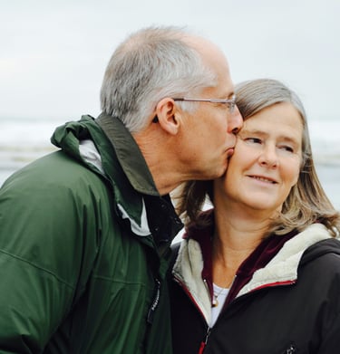 Empty nesters with mixed feelings about their children moving forward into adulthood