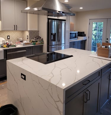 new kitchen with waterfall island edge