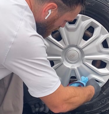 Jody cleaning a wheel