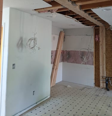 new beam in ceiling to replace walls and post