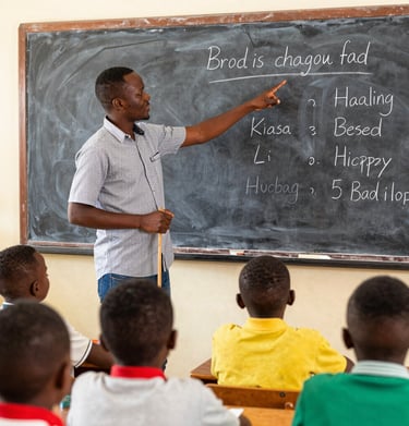 A young woman proudly holding a certificate after completing a skills training.