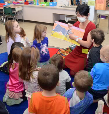 Sharing a Lunar New Year story with students in Tioga Hills Elementary