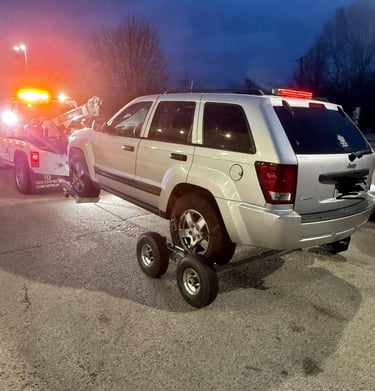 Lightning Towing and Recovery Services towing a Jeep Grand Cherokee in Bourbonnais Illinois