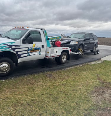 Lightning Towing and Recovery Services towing a Ford Expedition in Bourbonnais Illinois
