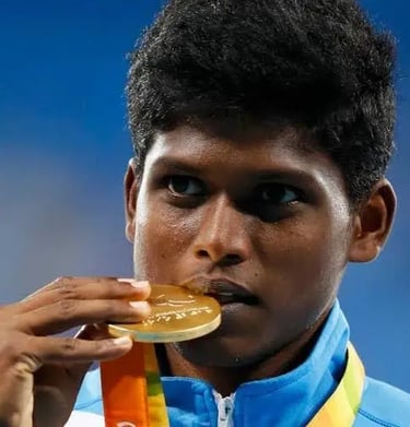 Mariyappan Thangavelu, Indian Paralympic high jumper, winning gold medal.