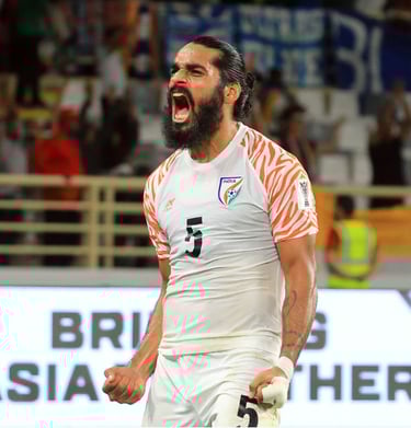 Sandesh Jhingan celebrating passionately after a match victory.