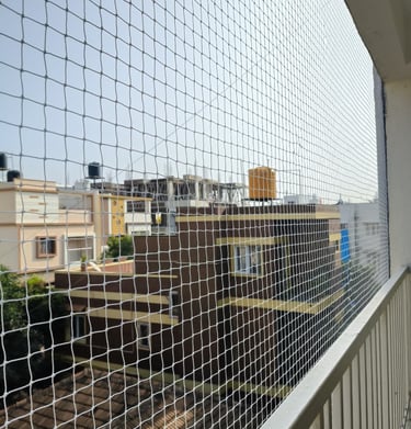 Close-up detail of the tightly woven netting material designed to prevent accidents.