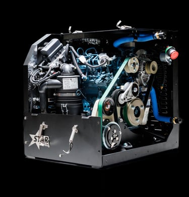 A heavy-duty industrial diesel engine unit with belts and pulleys inside a black metal casing.