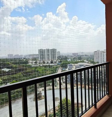 Balcony safety net installed in a Sarjapur home, blending seamlessly with the building’s design.