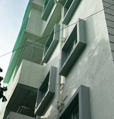 Side view of duct area covered with a durable net, highlighting clean installation work.