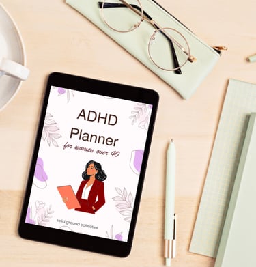 a tablet with a digital planner and a cup of coffee