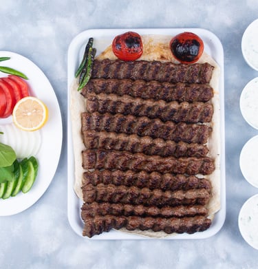 a plate of meat and vegetables on a table